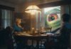 Geico Gecko parody as a large movie monster looking in on a couple through their window